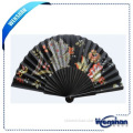 antique sandalwood hand fan with black ribs